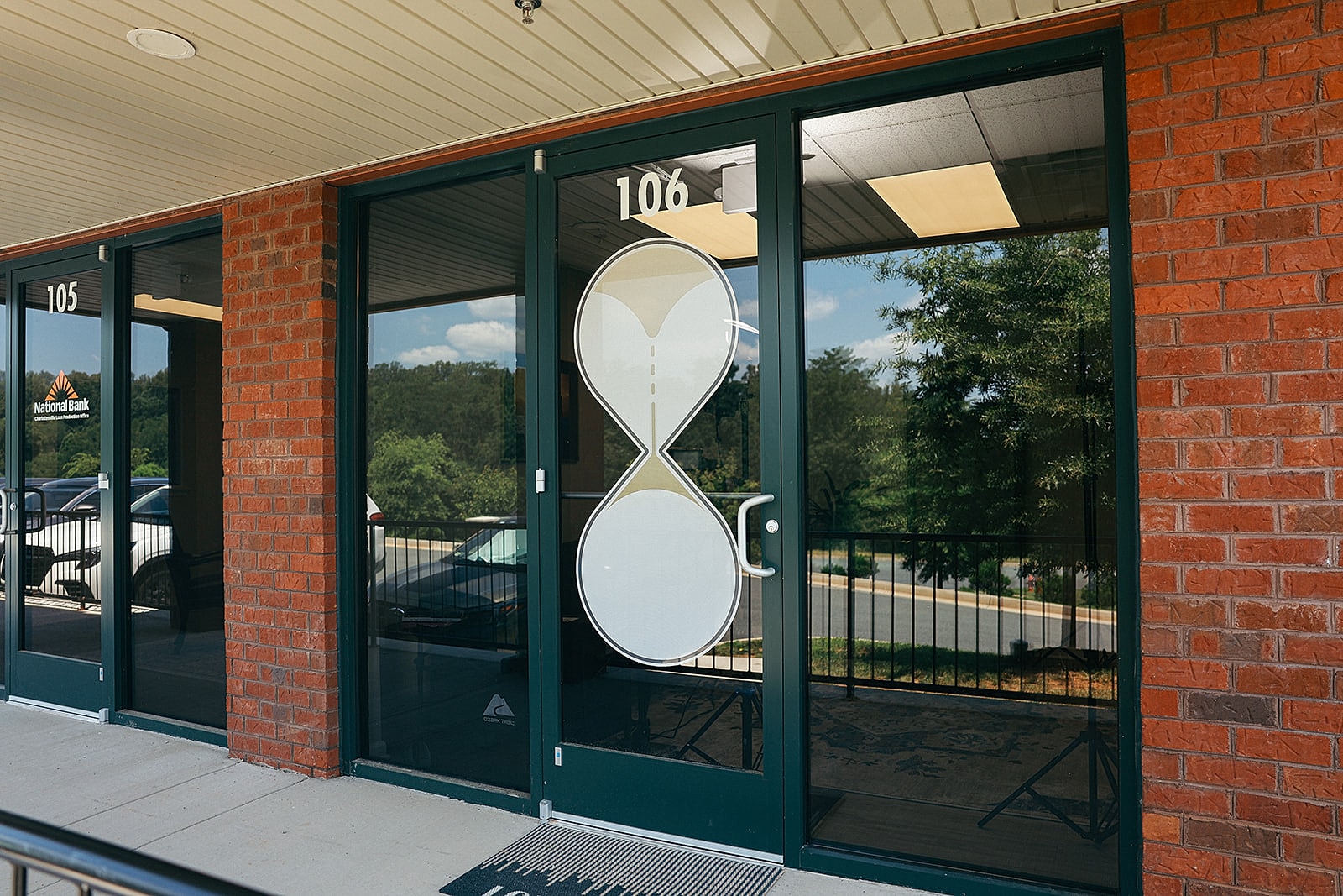 Person writing in notebook with pen.